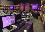TV displays setup for dinner function at a San Francisco winery.