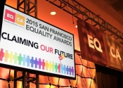 Stage display screen hanging over stage with lighting for 2015 San Francisco Equality Awards event.